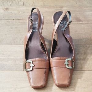 Womans sling back tan leather with gold buckle.